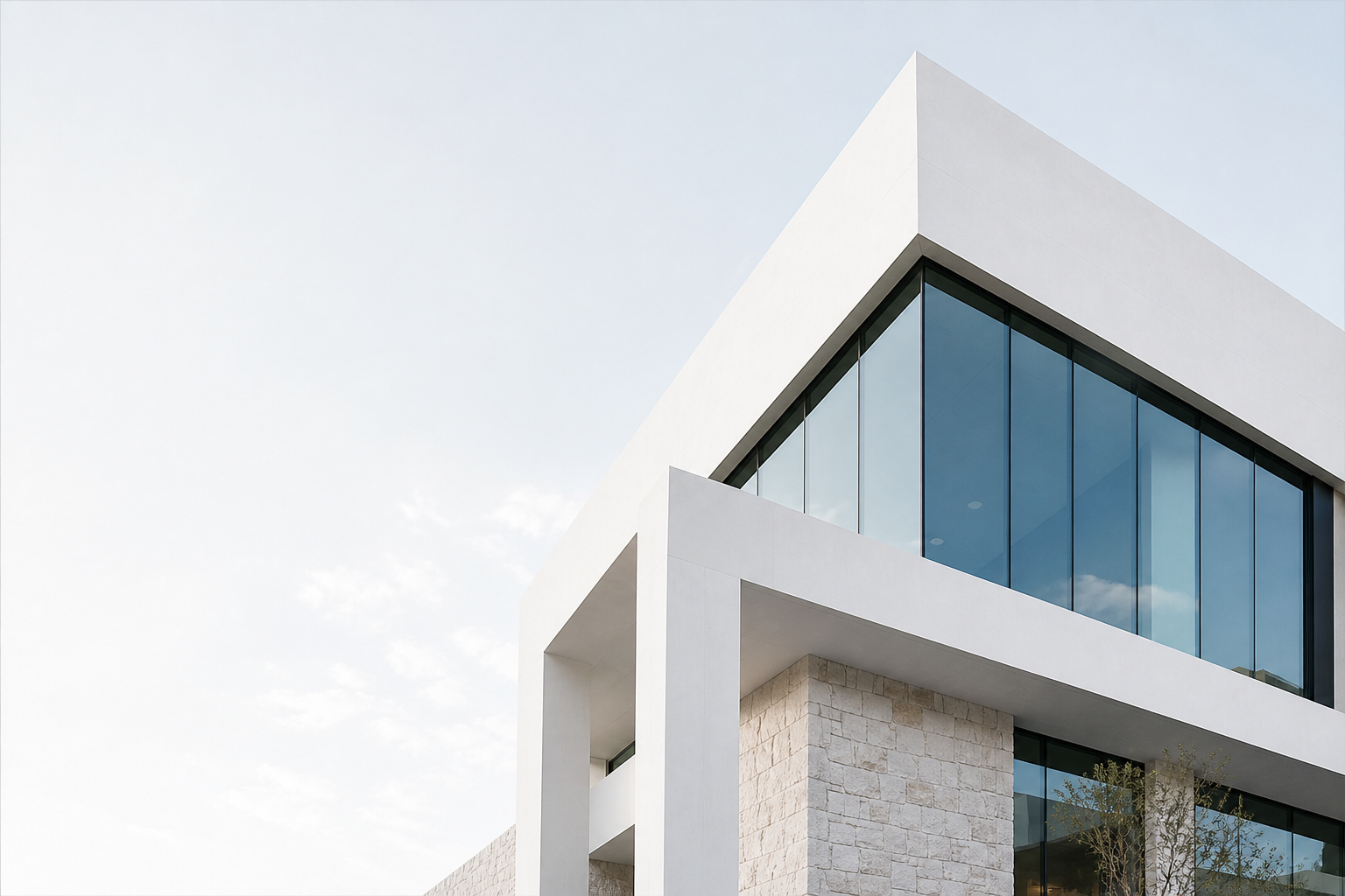 Contemporary home in the Austin metropolitan area with limestone and large windows